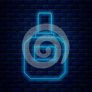 Glowing neon line Aftershave icon isolated on brick wall background. Cologne spray icon. Male perfume bottle. Vector