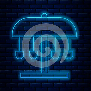 Glowing neon line Attraction carousel icon isolated on brick wall background. Amusement park. Childrens entertainment