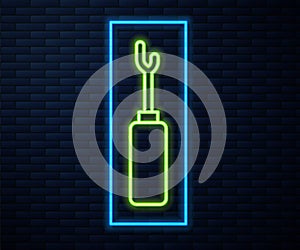 Glowing neon line Awl tool with wooden handle icon isolated on brick wall background. Work equipment tailor industry