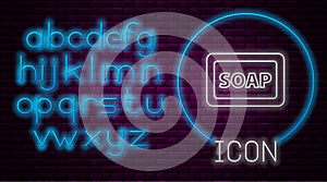 Glowing neon line Bar of soap with foam icon isolated on brick wall background. Soap bar with bubbles. Neon light