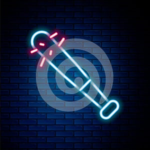 Glowing neon line Baseball bat with nails icon isolated on brick wall background. Violent weapon. Colorful outline