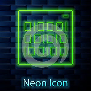 Glowing neon line Binary code icon isolated on brick wall background. Vector