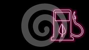 Glowing neon line Bio fuel concept with fueling nozzle and leaf icon isolated on black background. Gas station with