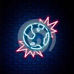 Glowing neon line Bomb explosive planet earth war danger icon isolated on brick wall background. Colorful outline