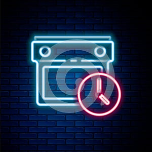 Glowing neon line Calendar and clock icon isolated on brick wall background. Schedule, appointment, organizer, timesheet