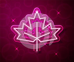 Glowing neon line Canadian maple leaf icon isolated on red background. Canada symbol maple leaf. Vector