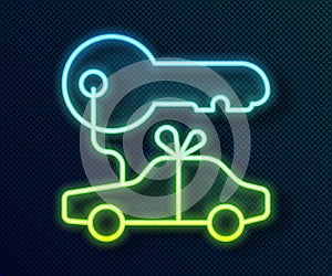 Glowing neon line Car gift icon isolated on black background. Car key prize. Vector