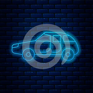 Glowing neon line Car icon isolated on brick wall background. Vector Illustration