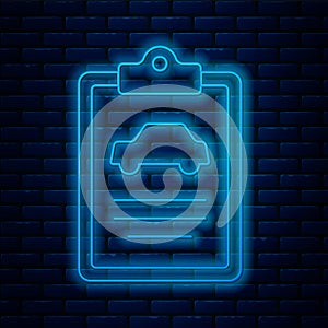 Glowing neon line Car inspection icon isolated on brick wall background. Car service. Vector