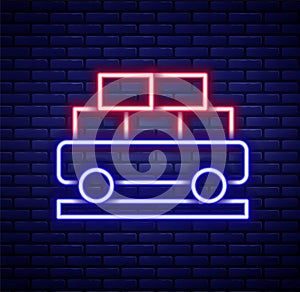 Glowing neon line Cargo train wagon icon isolated on brick wall background. Full freight car. Railroad transportation