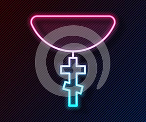 Glowing neon line Christian cross on chain icon isolated on black background. Church cross. Vector
