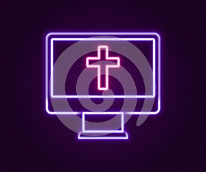 Glowing neon line Christian cross on monitor icon isolated on black background. Church cross. Colorful outline concept