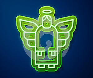Glowing neon line Christmas angel icon isolated on blue background. Vector