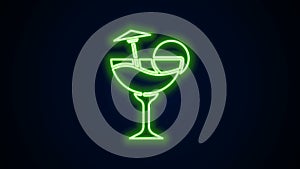 Glowing neon line Cocktail and alcohol drink with umbrella icon isolated on black background. 4K Video motion graphic