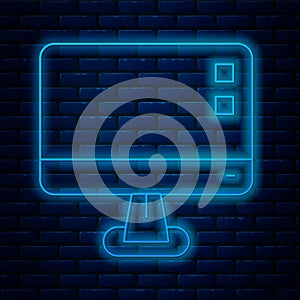 Glowing neon line Computer monitor screen icon isolated on brick wall background. Electronic device. Front view. Vector