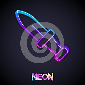 Glowing neon line Dagger icon isolated on black background. Knife icon. Sword with sharp blade. Vector