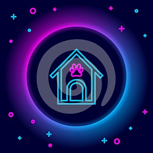 Glowing neon line Dog house and paw print pet icon isolated on black background. Dog kennel. Colorful outline concept