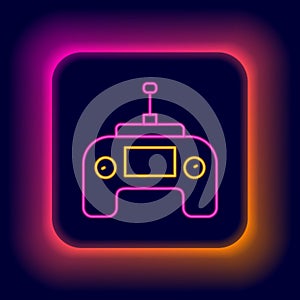 Glowing neon line Drone radio remote control transmitter icon isolated on black background. Colorful outline concept