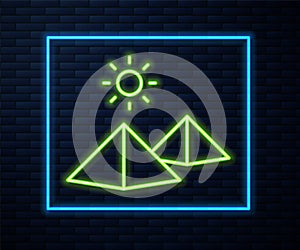 Glowing neon line Egypt pyramids icon isolated on brick wall background. Symbol of ancient Egypt. Vector