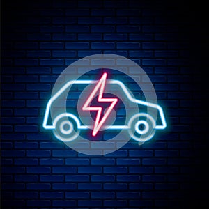 Glowing neon line Electric car and electrical cable plug charging icon isolated on brick wall background. Renewable eco