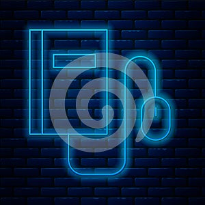 Glowing neon line Electronic book with mouse icon isolated on brick wall background. Online education concept. E-book