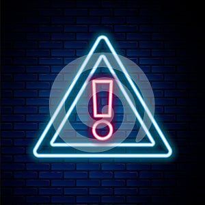 Glowing neon line Exclamation mark in triangle icon isolated on brick wall background. Hazard warning sign, careful