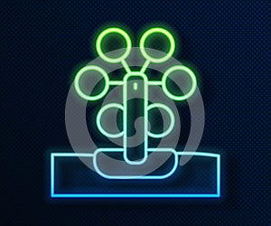 Glowing neon line Ferris wheel icon isolated on blue background. Amusement park. Childrens entertainment playground