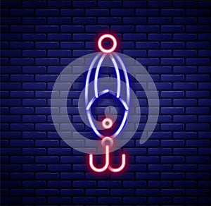 Glowing neon line Fishing lure icon isolated on brick wall background. Fishing tackle. Colorful outline concept. Vector