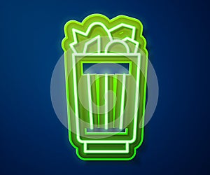 Glowing neon line Full trash can icon isolated on blue background. Garbage bin sign. Recycle basket icon. Office trash