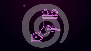 Glowing neon line Give gift icon isolated on black background. Gift in hand. The concept of giving and receiving a gift