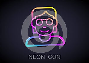 Glowing neon line Hacker or coder icon isolated on black background. Programmer developer working on code, coding