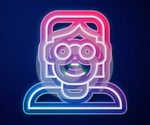 Glowing neon line Hacker or coder icon isolated on blue background. Programmer developer working on code, coding