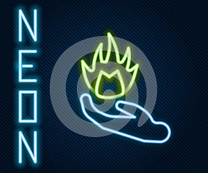 Glowing neon line Hand holding a fire icon isolated on black background. Colorful outline concept. Vector