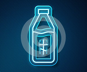 Glowing neon line Holy water bottle icon isolated on blue background. Glass flask with magic liquid. Vector