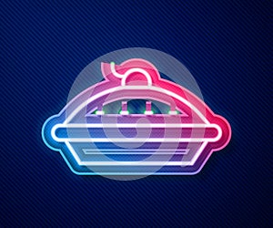 Glowing neon line Homemade pie icon isolated on blue background. Vector