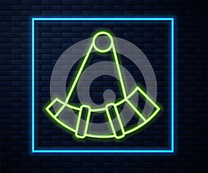 Glowing neon line Hunting horn icon isolated on brick wall background. Vector