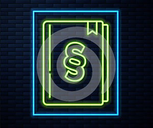 Glowing neon line Law book icon isolated on brick wall background. Legal judge book. Judgment concept. Vector