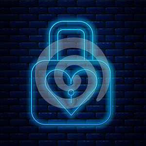 Glowing neon line Lock and heart icon isolated on brick wall background. Locked Heart. Love symbol and keyhole sign