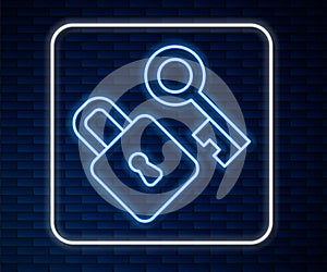 Glowing neon line Lock with key icon isolated on brick wall background. Love symbol and keyhole sign. Vector