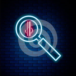 Glowing neon line Magnifying glass and dollar symbol icon isolated on brick wall background. Find money. Looking for