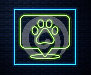 Glowing neon line Map pointer with veterinary medicine hospital, clinic or pet shop for animals icon isolated on brick