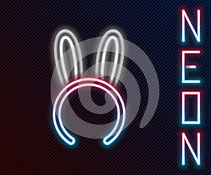 Glowing neon line Mask with long bunny ears icon isolated on black background. Fetish accessory. Sex toy for adult