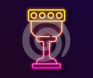 Glowing neon line Medieval goblet icon isolated on black background. Holy grail. Vector