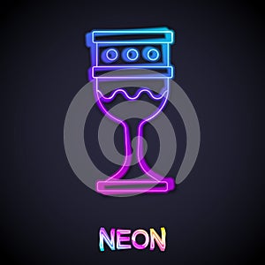 Glowing neon line Medieval goblet icon isolated on black background. Holy grail. Vector