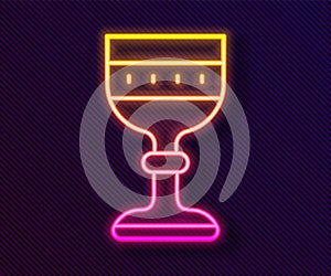Glowing neon line Medieval goblet icon isolated on black background. Vector