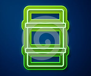 Glowing neon line Metal beer keg icon isolated on blue background. Vector