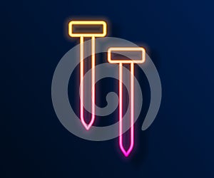 Glowing neon line Metallic nails icon isolated on black background. Vector