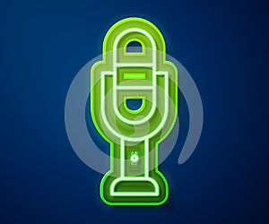 Glowing neon line Microphone icon isolated on blue background. On air radio mic microphone. Speaker sign. Vector