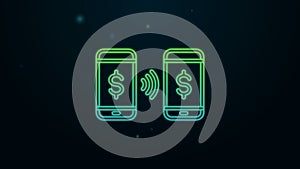 Glowing neon line Money payment transfer in mobile icon isolated on black background. Concept of fast pay by purchase