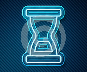Glowing neon line Old hourglass with flowing sand icon isolated on blue background. Sand clock sign. Business and time